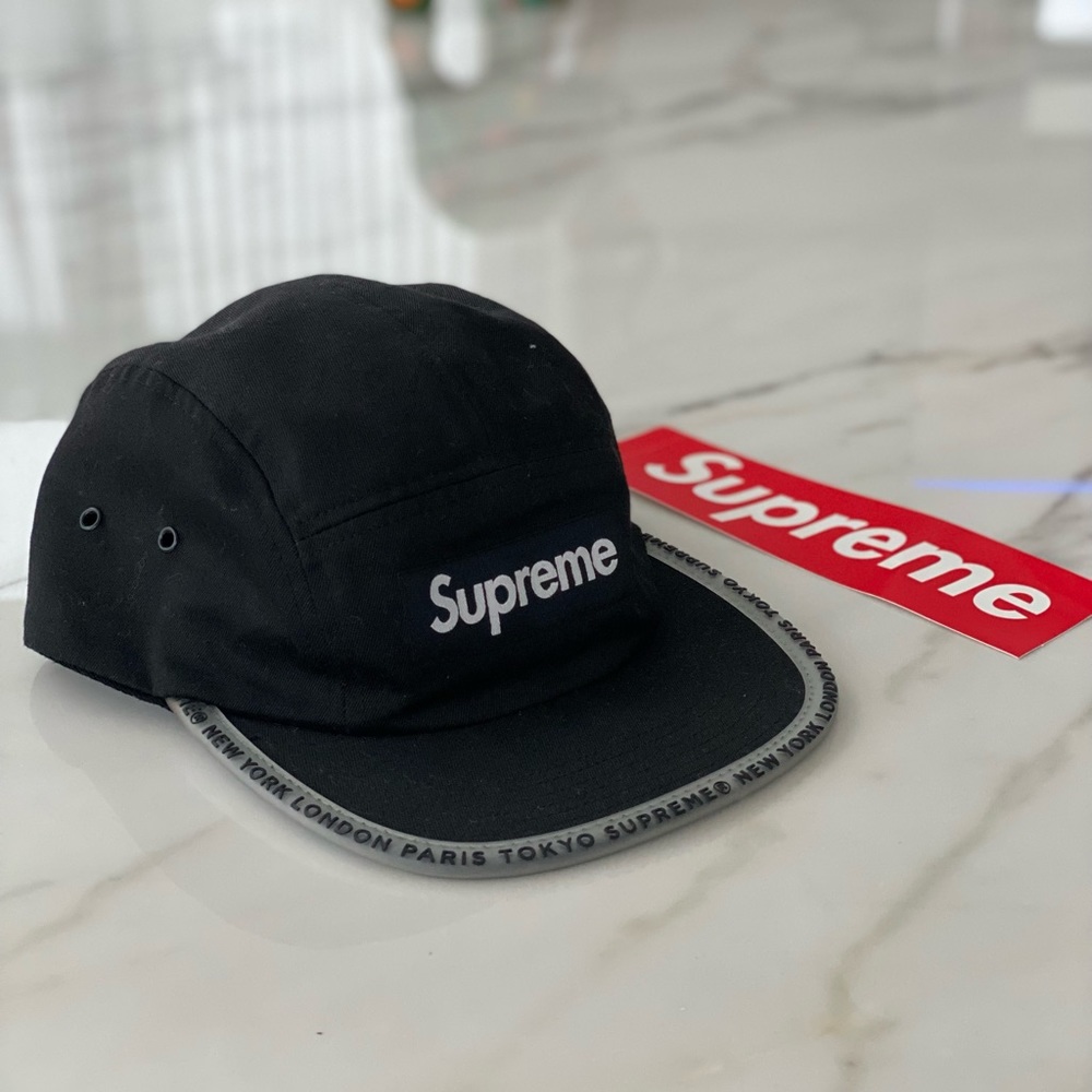Supreme 
Worldwide Visor Tape Camp Cap